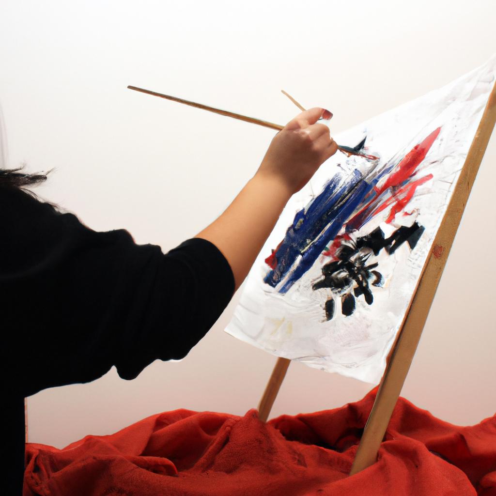 Person painting with brush strokes